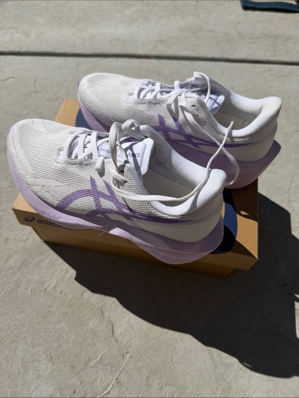 Asics Novablast 6. White Running Shoes with Lavender Accents. Women’s 8 Wide